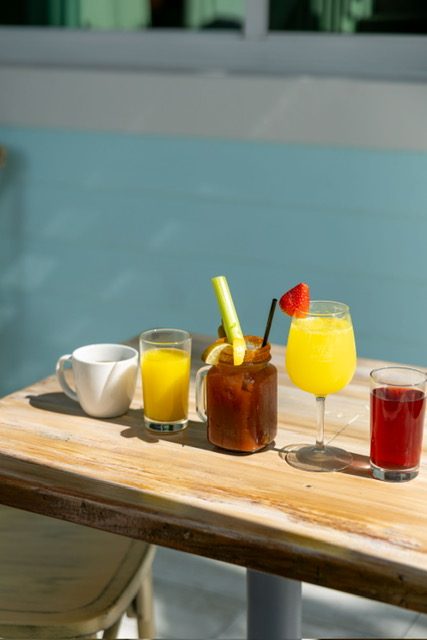 Mimosa, bloody mary, coffee and fresh orange juice on the patio at Doreen's Cup of Joe