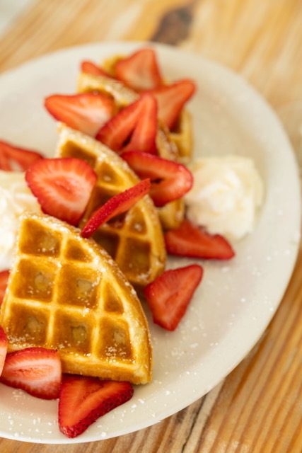 Belgian waffles with fresh strawberries
